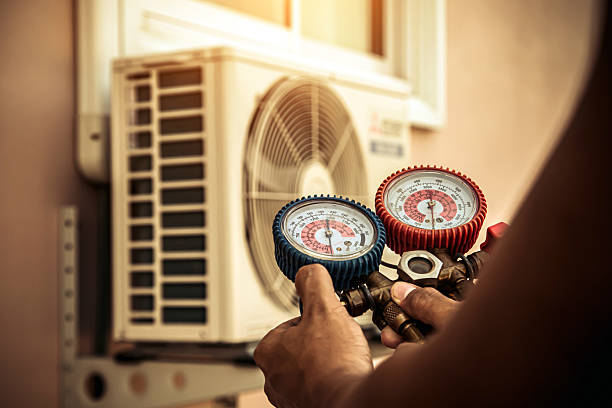 Professional Ac Installation technician working in McChord AFB, WA